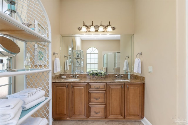 2792 Pga Blvd, Navarre, FL 32566 - bathroom featuring an enclosed shower and double vanity