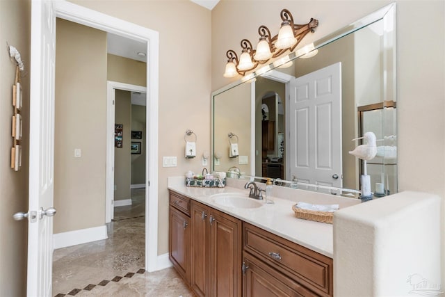 2792 Pga Blvd, Navarre, FL 32566 - bathroom featuring vanity, baseboards, and marble finish flooring