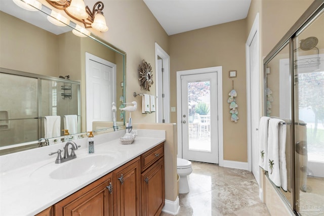 2792 Pga Blvd, Navarre, FL 32566 - full bath with vanity, toilet, a stall shower, and baseboards