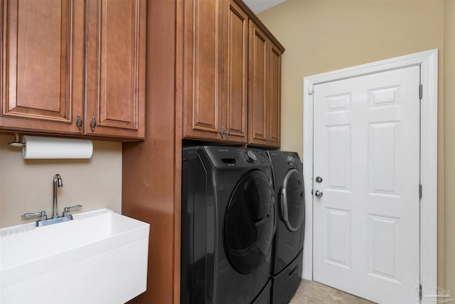 2792 Pga Blvd, Navarre, FL 32566 - laundry room featuring washing machine and dryer and cabinet space