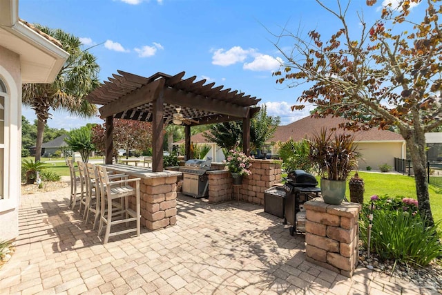 2792 Pga Blvd, Navarre, FL 32566 - view of patio featuring a pergola and area for grilling