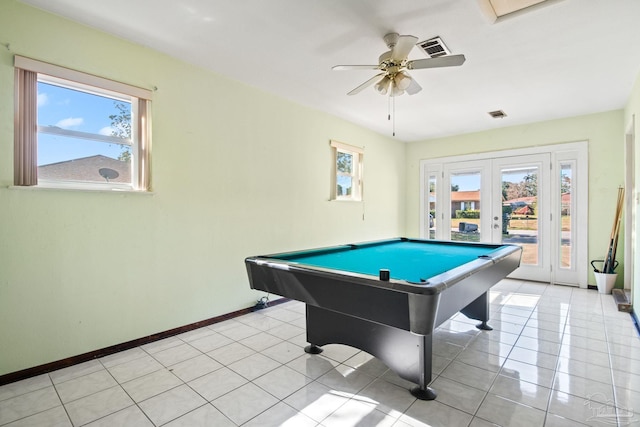 playroom featuring ceiling fan, french doors, plenty of natural light, and light tile patterned flooring