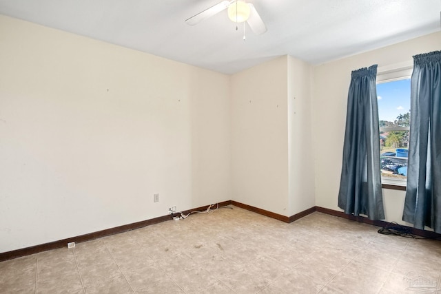 unfurnished room featuring ceiling fan