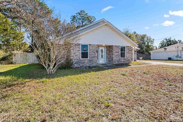 view of front facade with a front lawn