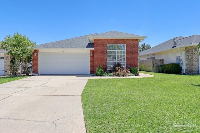 ranch-style house with a front lawn and a garage