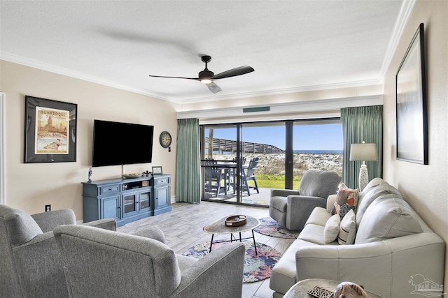 living room featuring crown molding, ceiling fan, and light hardwood / wood-style floors