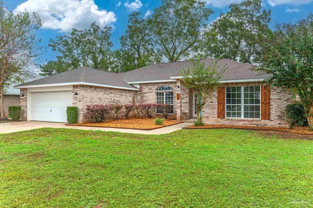 ranch-style home featuring a garage and a front yard