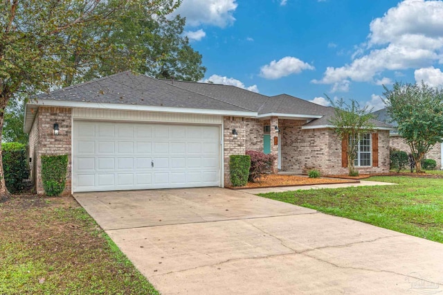 ranch-style home featuring a garage and a front yard