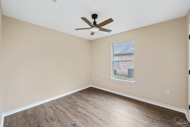 unfurnished room featuring hardwood / wood-style flooring and ceiling fan