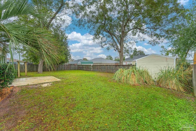 view of yard with a patio area