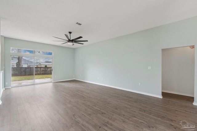 spare room featuring dark hardwood / wood-style floors and ceiling fan