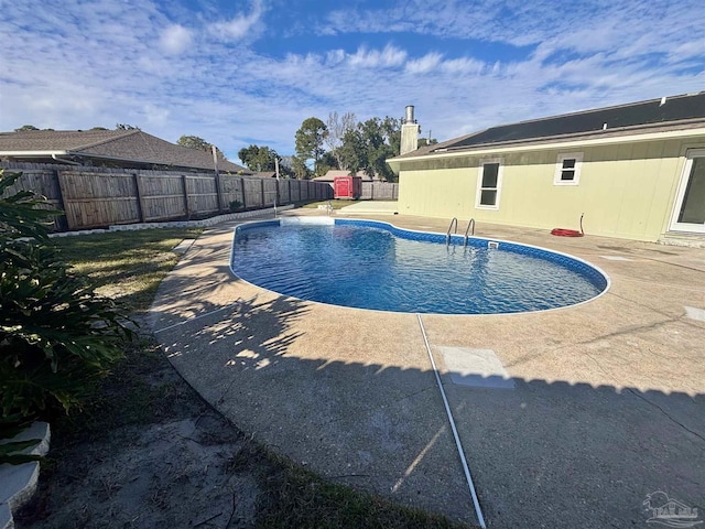 view of pool featuring a patio