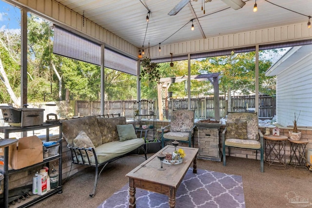 sunroom / solarium with ceiling fan