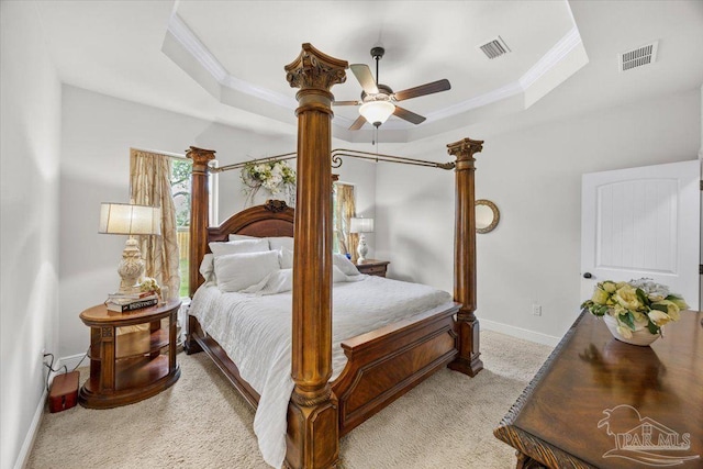 2219 River Birch Rd, Gulf Breeze, FL 32563 - bedroom featuring a raised ceiling, crown molding, carpet floors, baseboards, and ceiling fan