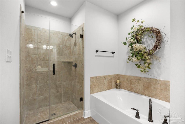 2219 River Birch Rd, Gulf Breeze, FL 32563 - bathroom with a garden tub, a stall shower, and recessed lighting