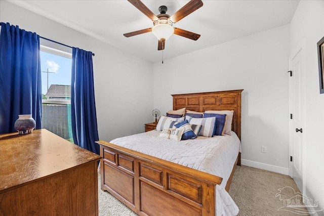 2219 River Birch Rd, Gulf Breeze, FL 32563 - bedroom with light colored carpet, baseboards, and ceiling fan