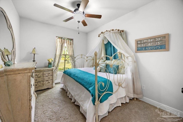 2219 River Birch Rd, Gulf Breeze, FL 32563 - bedroom featuring carpet floors, baseboards, and ceiling fan