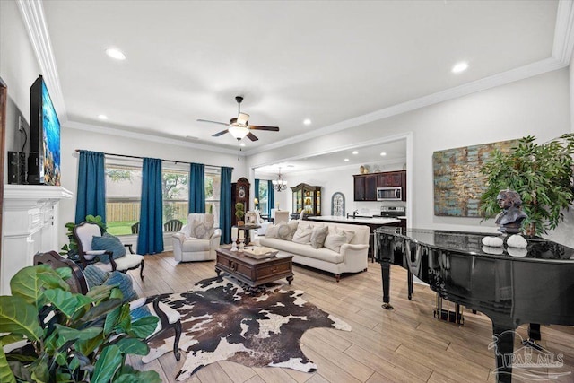 2219 River Birch Rd, Gulf Breeze, FL 32563 - living room with ceiling fan, a chandelier, light wood-style floors, recessed lighting, and crown molding