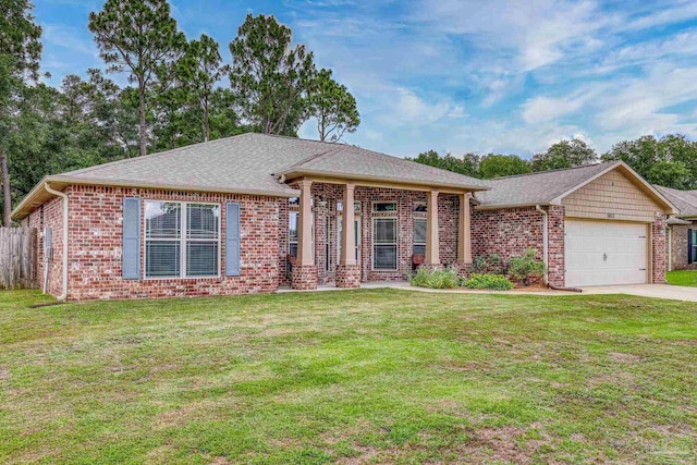 5613 Cane Syrup Cir, Pace, FL 32571 - view of front of property with brick siding, an attached garage, driveway, and roof with shingles