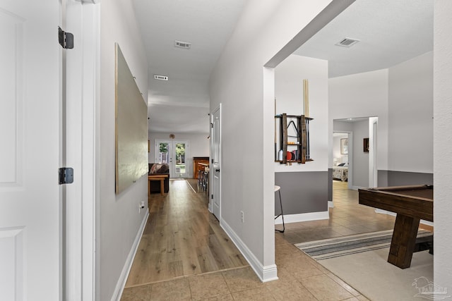 5613 Cane Syrup Cir, Pace, FL 32571 - hallway with light tile patterned floors and baseboards