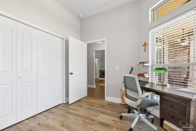 5613 Cane Syrup Cir, Pace, FL 32571 - office space featuring wood finished floors and baseboards