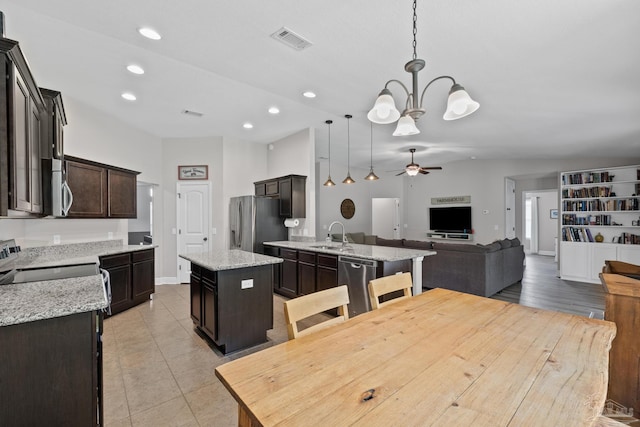 5613 Cane Syrup Cir, Pace, FL 32571 - dining room with ceiling fan, recessed lighting, light tile patterned floors, baseboards, and a chandelier
