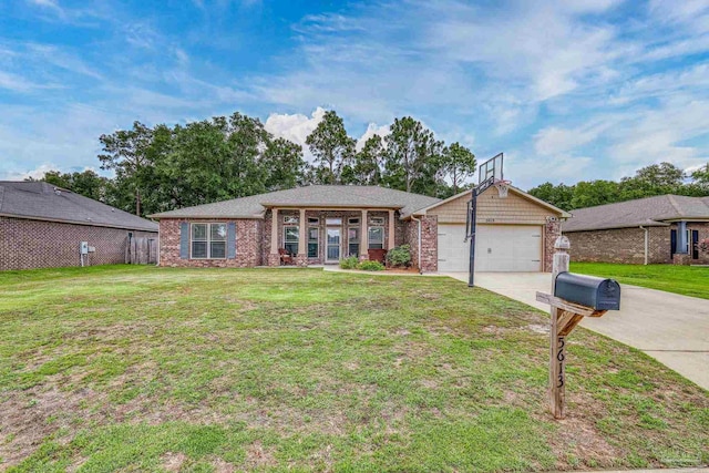 5613 Cane Syrup Cir, Pace, FL 32571 - ranch-style house with concrete driveway, a front lawn, brick siding, and an attached garage