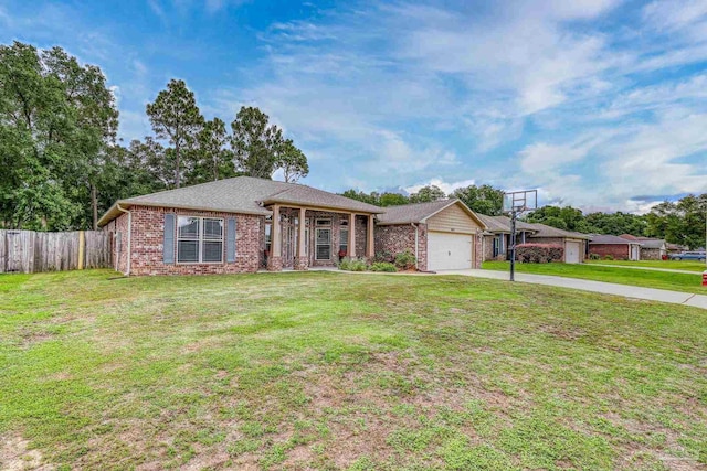 5613 Cane Syrup Cir, Pace, FL 32571 - single story home with a garage, driveway, and brick siding