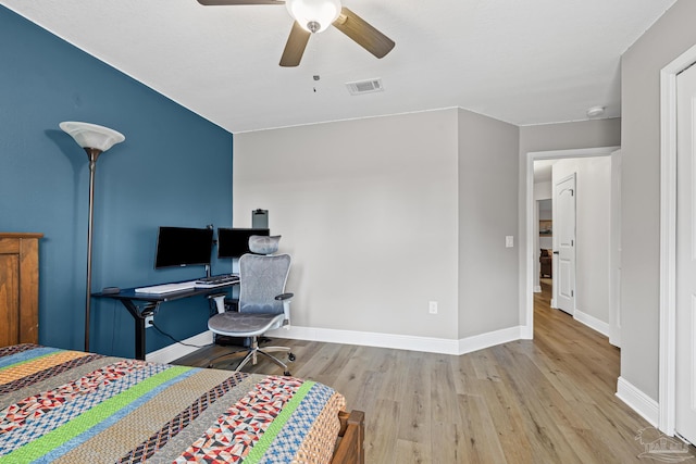 5613 Cane Syrup Cir, Pace, FL 32571 - bedroom with wood finished floors, baseboards, and ceiling fan