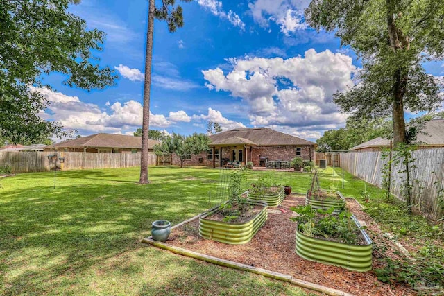 5613 Cane Syrup Cir, Pace, FL 32571 - view of yard with a garden