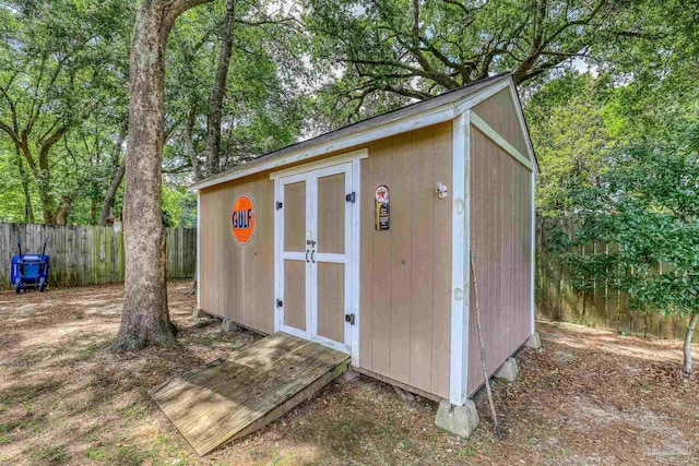 5613 Cane Syrup Cir, Pace, FL 32571 - view of shed featuring a fenced backyard