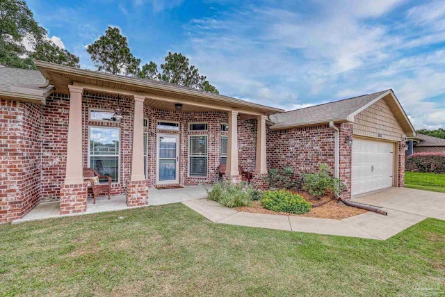 5613 Cane Syrup Cir, Pace, FL 32571 - ranch-style house with brick siding, a garage, a front yard, and concrete driveway