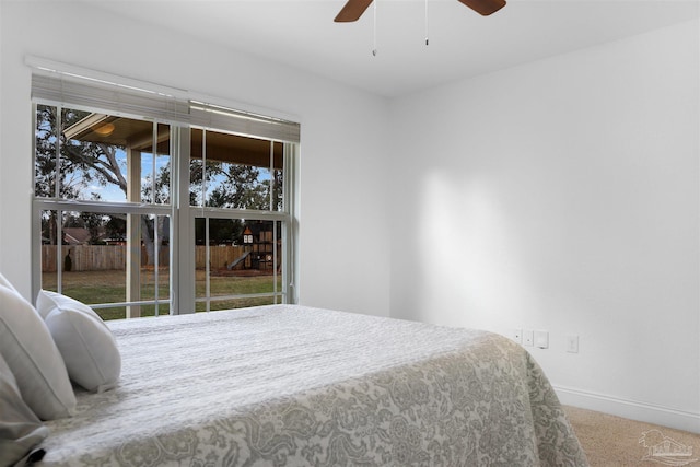 unfurnished bedroom featuring carpet and ceiling fan