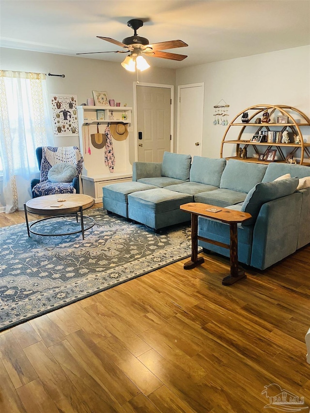 7453 Northpointe Blvd, Pensacola, FL 32514 - living room with wood finished floors and ceiling fan