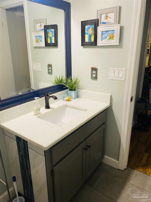 7453 Northpointe Blvd, Pensacola, FL 32514 - bathroom featuring tile patterned floors, vanity, and baseboards