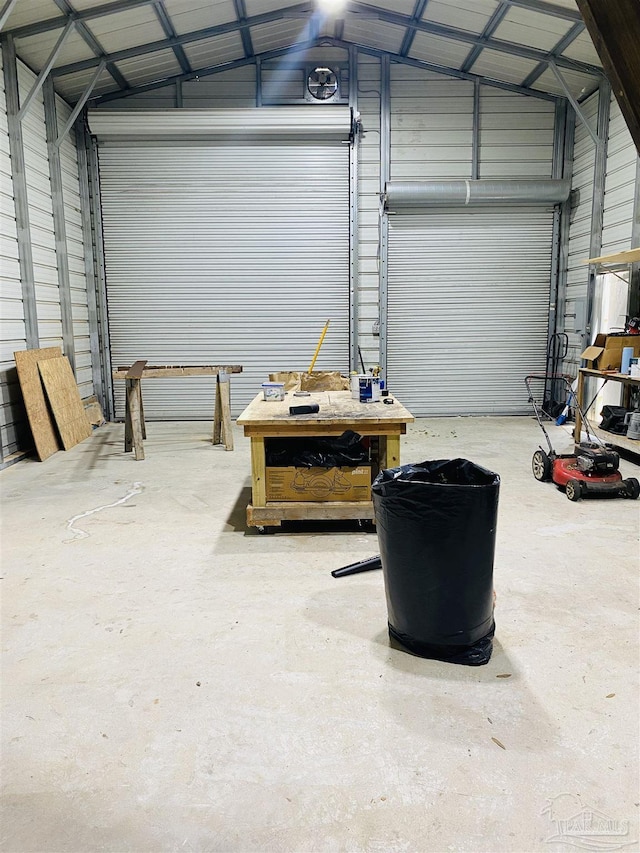 7453 Northpointe Blvd, Pensacola, FL 32514 - garage featuring metal wall and a workshop area