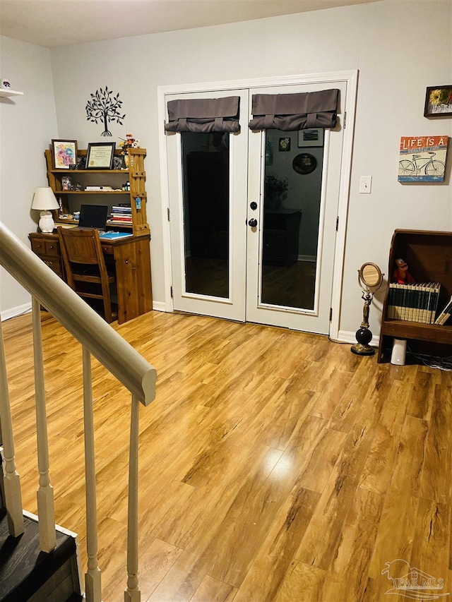 7453 Northpointe Blvd, Pensacola, FL 32514 - interior space featuring french doors, light wood-type flooring, and baseboards