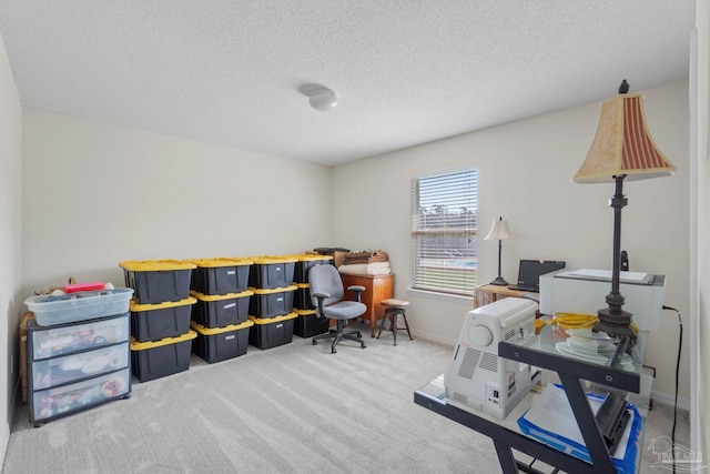 6742 Britt St, Navarre, FL 32566 - carpeted office with a textured ceiling and baseboards