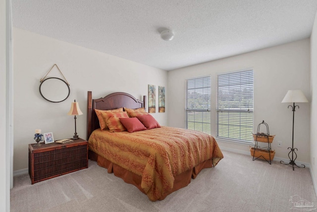 6742 Britt St, Navarre, FL 32566 - bedroom with carpet flooring, baseboards, and a textured ceiling