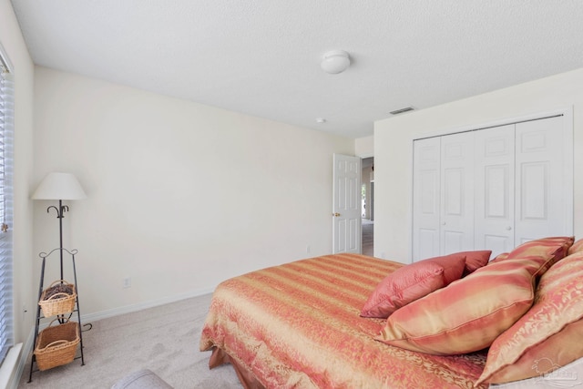 6742 Britt St, Navarre, FL 32566 - carpeted bedroom featuring a closet and baseboards