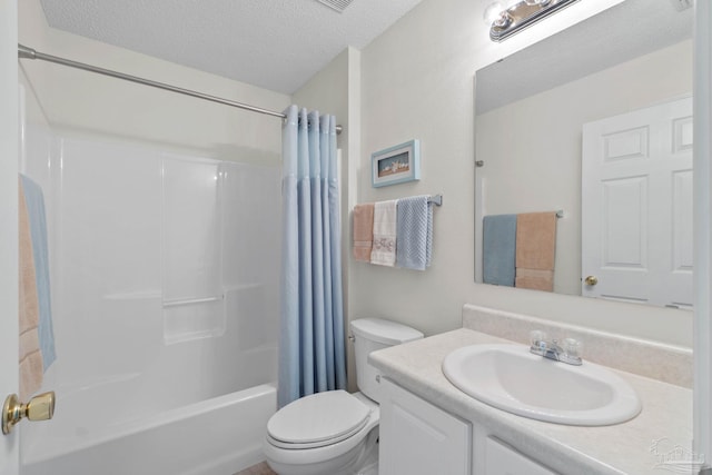 6742 Britt St, Navarre, FL 32566 - full bath with toilet, vanity, shower / tub combo, and a textured ceiling