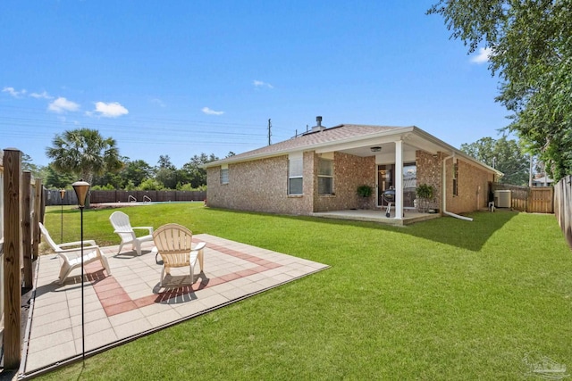 6742 Britt St, Navarre, FL 32566 - view of yard featuring a patio area and central AC unit