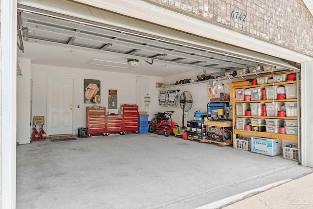6742 Britt St, Navarre, FL 32566 - garage featuring a garage door opener