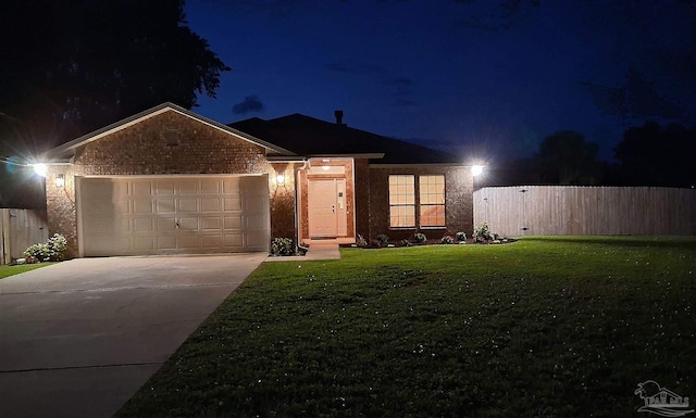 6742 Britt St, Navarre, FL 32566 - ranch-style home with a garage, driveway, and brick siding