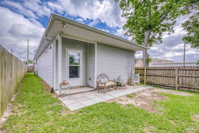 rear view of property with a patio
