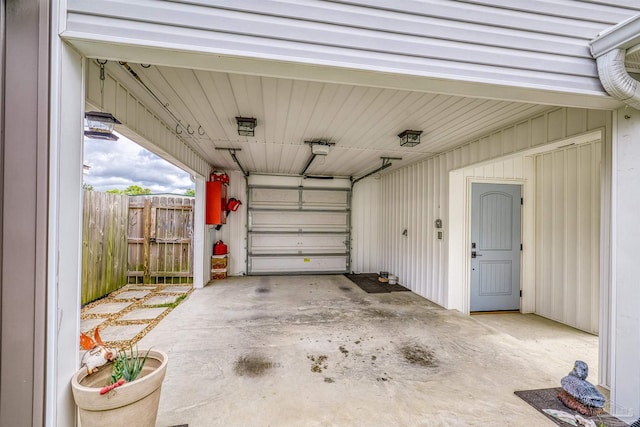 garage with fence