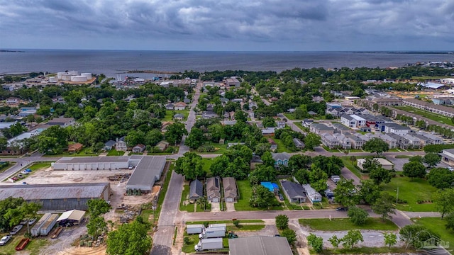 aerial overview of property's location featuring a nearby body of water and nearby suburban area