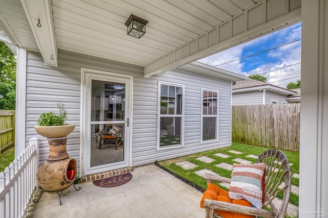 view of patio / terrace featuring fence