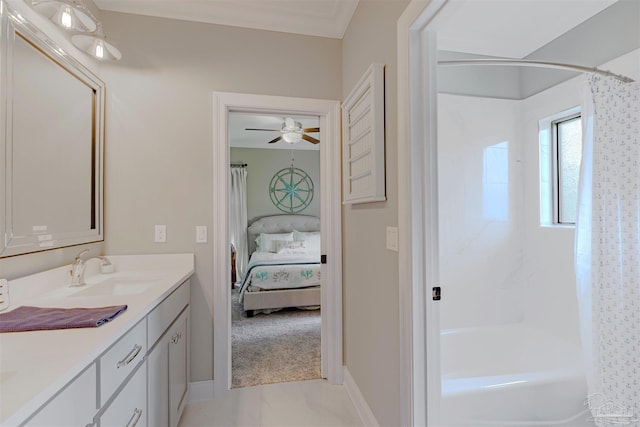 full bathroom with ceiling fan, shower / tub combo, vanity, baseboards, and connected bathroom