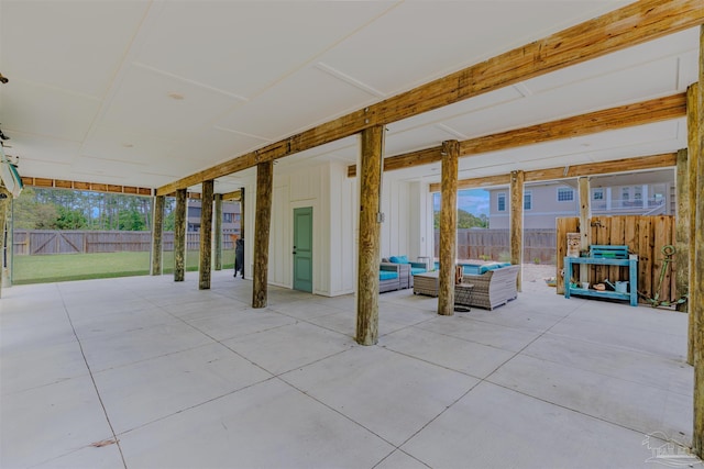 view of patio with an outdoor living space and a fenced backyard